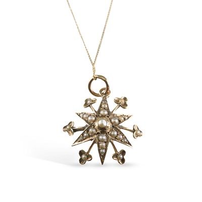 Lot 746 - A SEED PEARL STAR PENDANT ON CHAIN