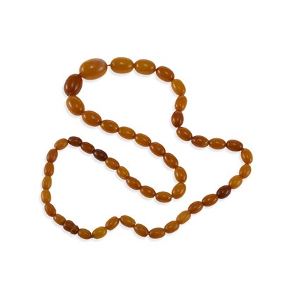Lot 773 - A BUTTERSCOTCH AMBER BEAD NECKLACE