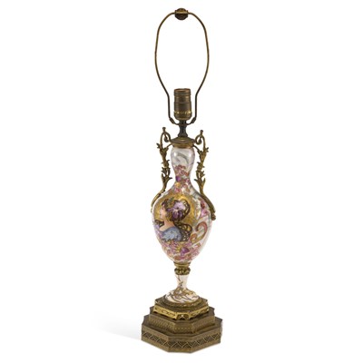 Lot 1012 - A FRENCH GILT METAL MOUNTED PORCELAIN LAMP