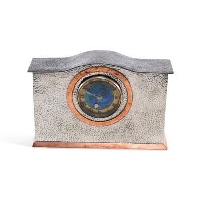 Lot 195 - A LIBERTY & CO TUDRIC PEWTER AND COPPER MANTEL CLOCK
