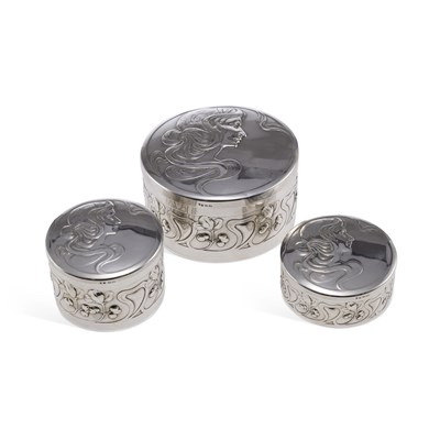 Lot 189 - WMF (WÜRTTEMBERGISCHE METALLWARENFABRIK), A SET OF THREE ART NOUVEAU DRESSING TABLE BOXES