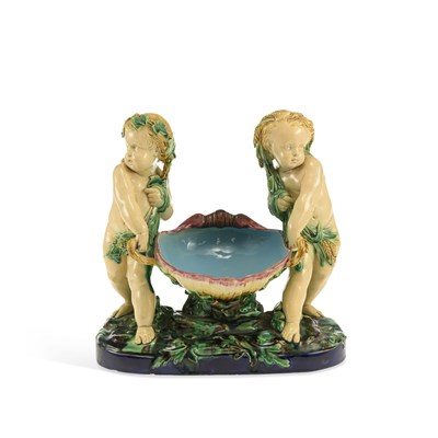 Lot 131 - A MINTON MAJOLICA CHERUBS BASKET