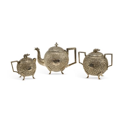 Lot 218 - AN INDIAN SILVER KUTCH THREE-PIECE TEA SERVICE
