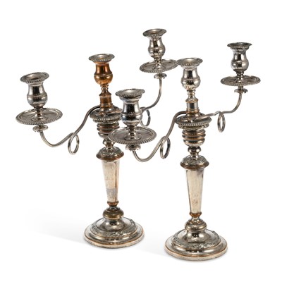 Lot 217 - A PAIR OF OLD SHEFFIELD PLATE THREE-LIGHT CANDELABRA