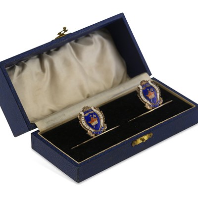 Lot 343 - A PAIR OF GEORGE V MASONIC SILVER AND ENAMEL NAPKIN HOLDERS