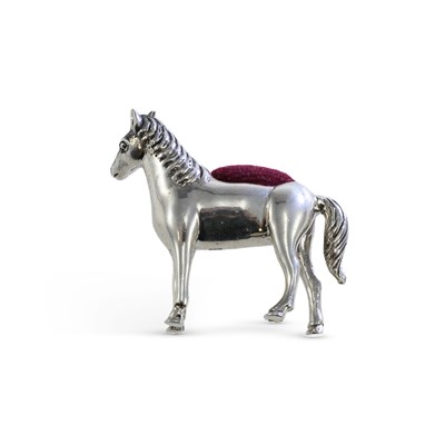 Lot 251 - A CONTINENTAL NOVELTY SILVER PIN CUSHION IN THE FORM OF A HORSE