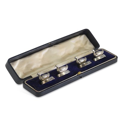 Lot 338 - A CASED SET OF EDWARDIAN NOVELTY SILVER DUCK MENU CARD HOLDERS