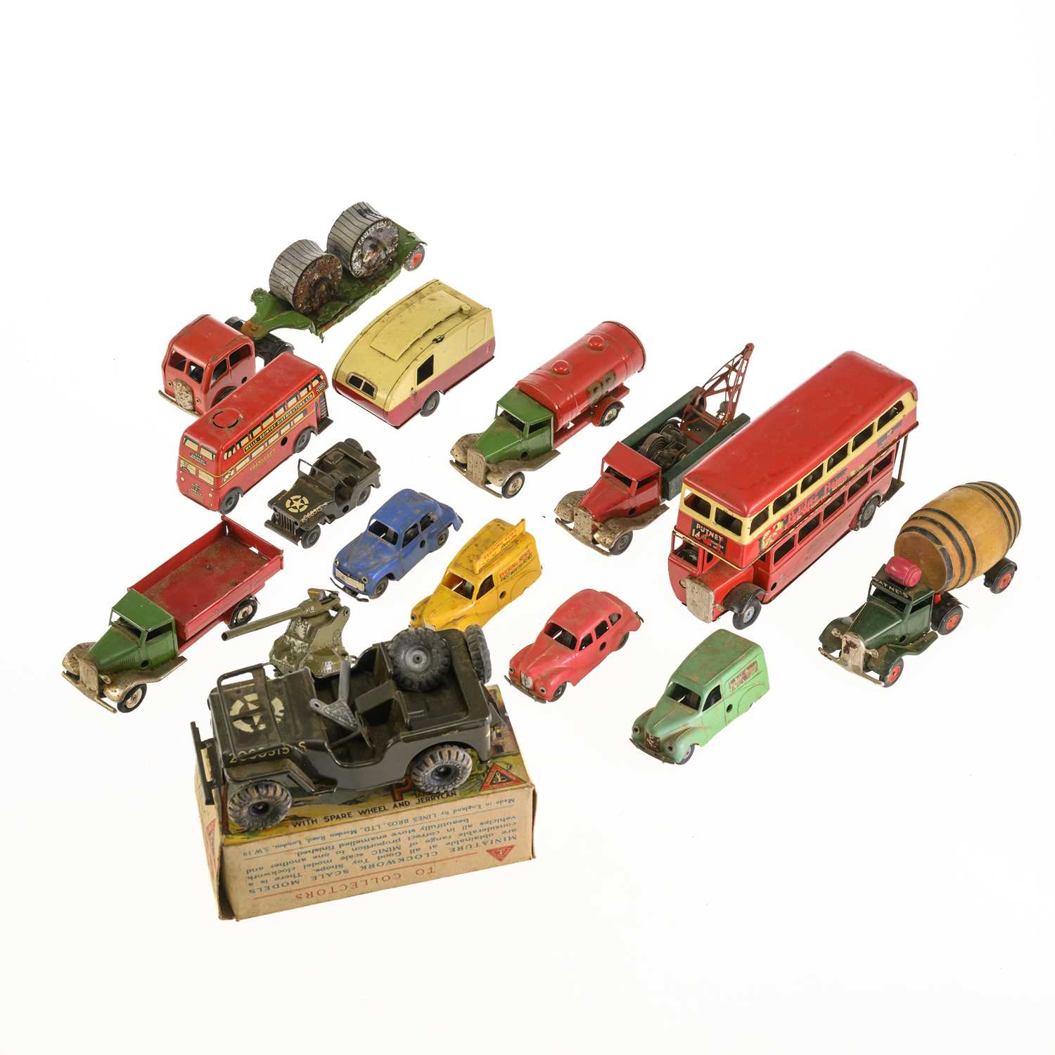 Lot 12 - A GROUP OF TRI-ANG MINIC TINPLATE TOYS