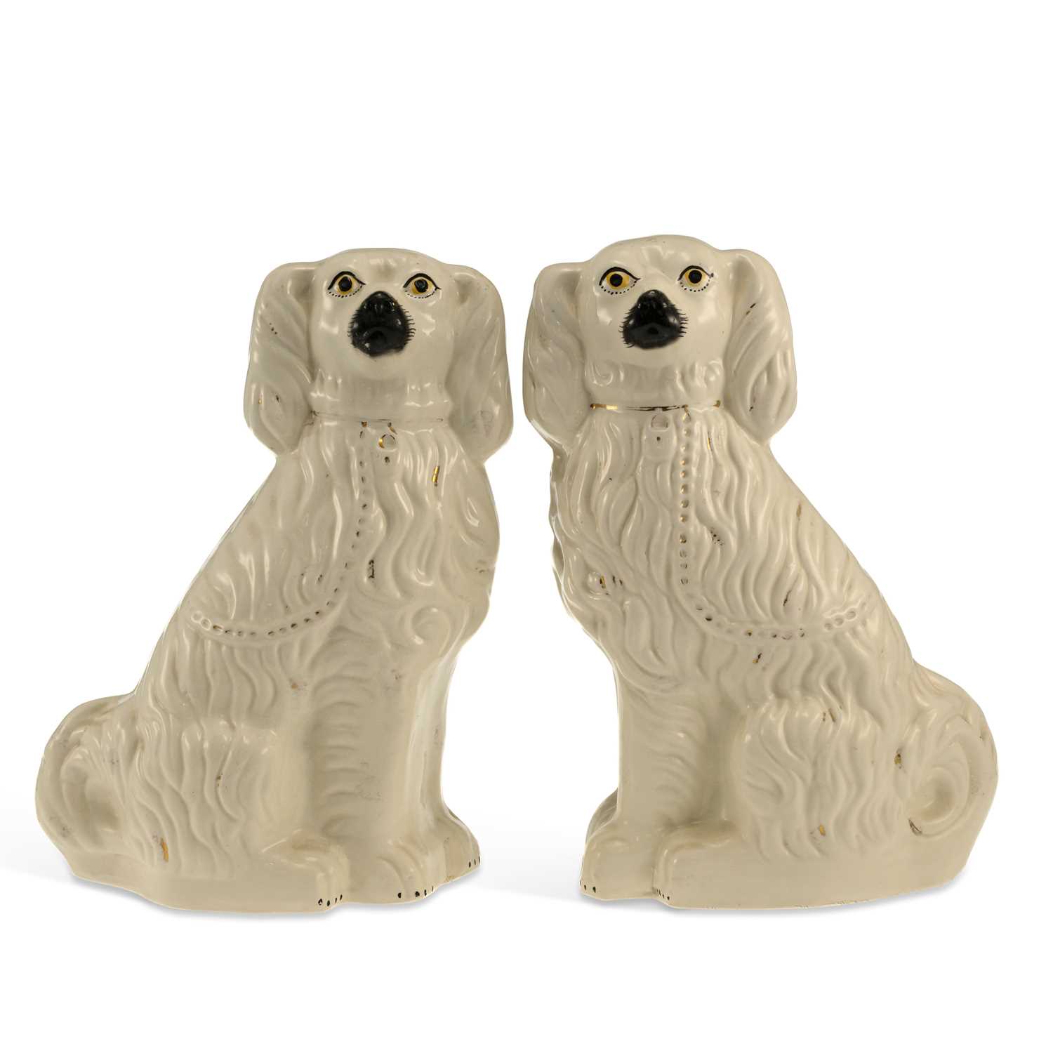 Lot 84 - A PAIR OF STAFFORDSHIRE POTTERY SPANIELS