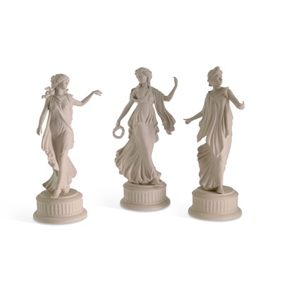 Lot 76 - A GROUP OF THREE WEDGWOOD WHITE BISCUIT FIGURES FROM THE ‘DANCING HOURS’ SERIES