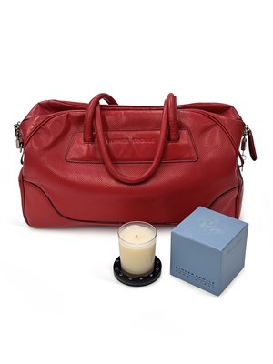 Lot 53 - A TANNER KROLLE RED LEATHER HOLDALL BAG TOGETHER WITH A TANNER KROLLE CANDLESTAND