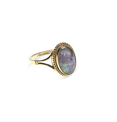 Lot 686 - A 9 CARAT GOLD BLACK OPAL RING