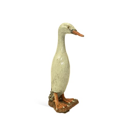 Lot 1004 - A GLAZED EARTHENWARE MODEL OF AN INDIAN RUNNER RUCK