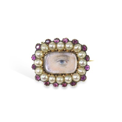 Lot 731 - A LATE 18TH CENTURY GOLD, RUBY AND SEED-PEARL LOVER’S EYE BROOCH