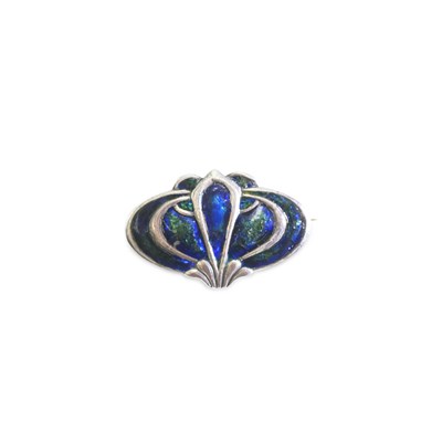 Lot 581 - A LIBERTY & CO ART NOUVEAU SILVER AND ENAMEL BROOCH