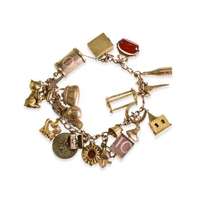 Lot 585 - A 9 CARAT GOLD CHARM BRACELET