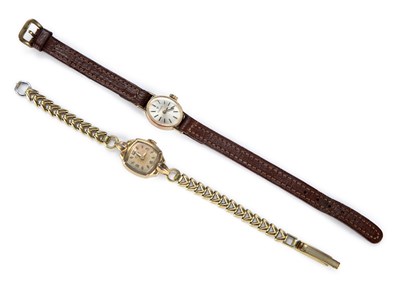 Lot 488 - A LADY'S 9CT GOLD TISSOT STRAP WATCH AND AN AVIA WATCH