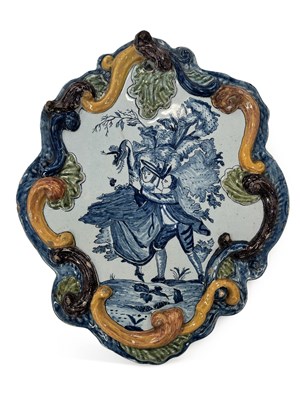 Lot 88 - A DUTCH DELFT POLYCHROME PLAQUE