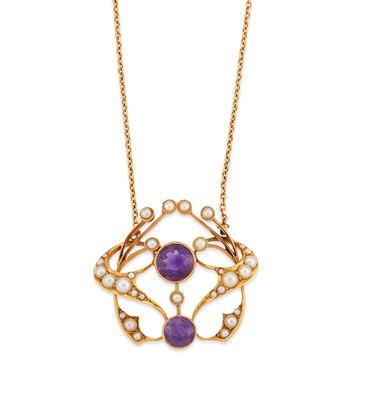 Lot 663 - AN ART NOUVEAU AMETHYST AND SEED PEARL PENDANT NECKLACE