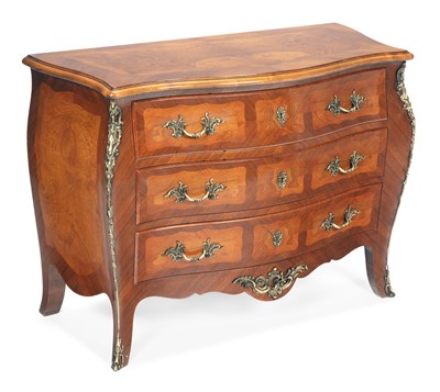 Lot 953 - A WALNUT BOMBE COMMODE