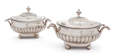 Lot 378 - A MATCHED PAIR OF GEORGE III / GEORGE IV SILVER COVERED TUREENS