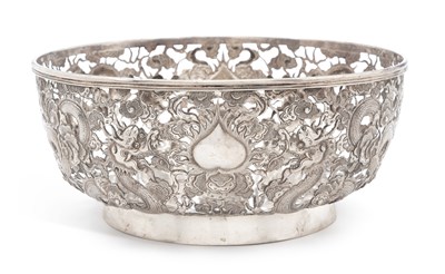 Lot 195 - A CHINESE EXPORT PIERCED SILVER 'DRAGON' BOWL