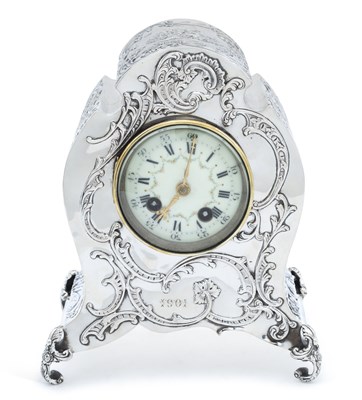 Lot 323 - A LATE VICTORIAN SILVER MANTEL CLOCK
