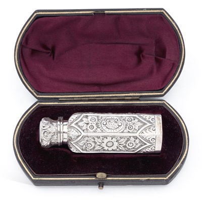 Lot 329 - A LATE VICTORIAN SILVER-CASED SCENT BOTTLE