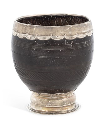 Lot 381 - A SILVER-MOUNTED COCONUT CUP