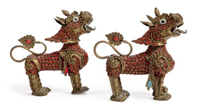 Lot 422 - A PAIR OF ASIAN GILT-METAL FO DOGS