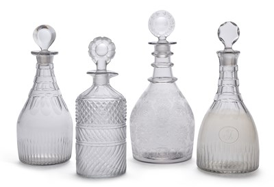 Lot 71 - FOUR CUT-GLASS DECANTERS