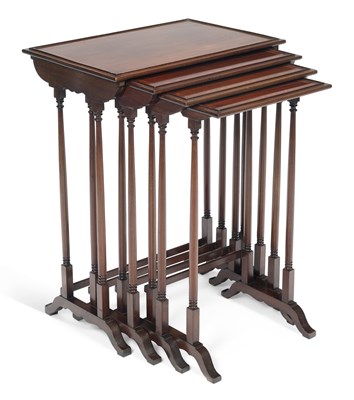 Lot 946 - A NEST OF FOUR EDWARDIAN MAHOGANY QUARTETTO TABLES