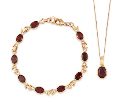 Lot 588 - A 9 CARAT GOLD GARNET BRACELET AND PENDANT ON CHAIN