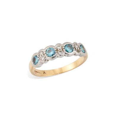 Lot 587 - AN 18 CARAT GOLD BLUE AND WHITE DIAMOND HALF HOOP RING