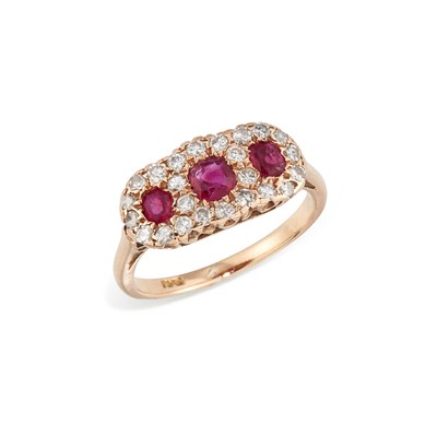 Lot 671 - A RUBY AND DIAMOND TRIPLE CLUSTER RING