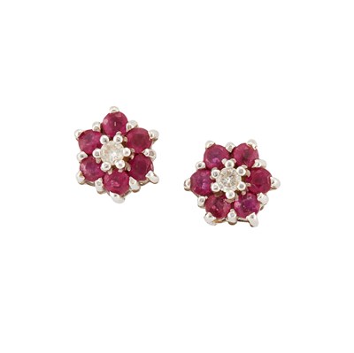 Lot 585 - A PAIR OF 18 CARAT GOLD RUBY AND DIAMOND CLUSTER EARRINGS
