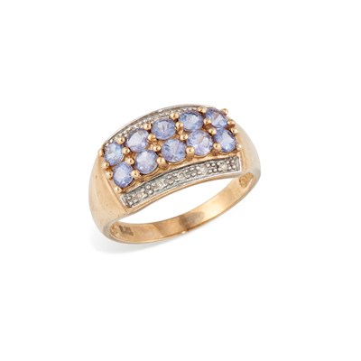 Lot 564 - A 9 CARAT GOLD TANZANITE AND DIAMOND RING