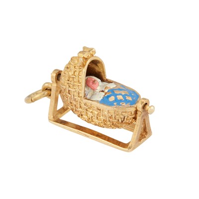 Lot 508 - A 9 CARAT GOLD BLUE ENAMEL CRADLE PENDANT CHARM