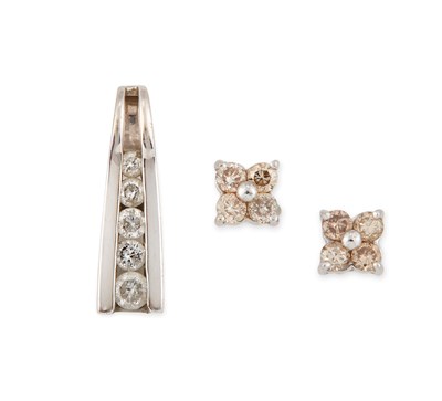Lot 525 - A PAIR OF 18 CARAT WHITE GOLD DIAMOND CLUSTER STUD EARRINGS AND A DIAMOND PENDANT