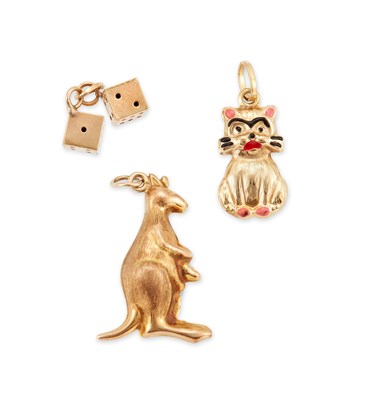 Lot 515 - THREE 9 CARAT GOLD NOVELTY CHARMS