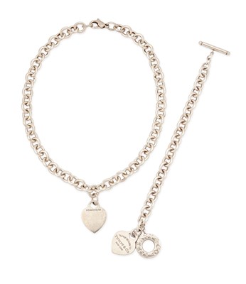 Lot 555 - TIFFANY & CO, A SILVER HEART TAG NECKLACE AND BRACELET