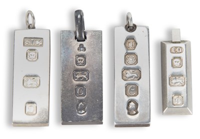 Lot 679 - FOUR SILVER INGOT PENDANTS