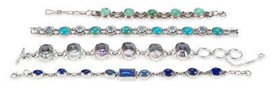 Lot 603 - FOUR SILVER GEM-SET BRACELETS