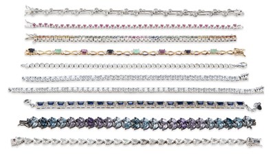 Lot 553 - A GROUP OF SILVER GEM-SET BRACELETS