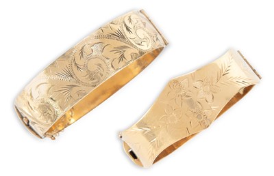 Lot 494 - TWO ROLLED GOLD HINGE OPENING BANGLES