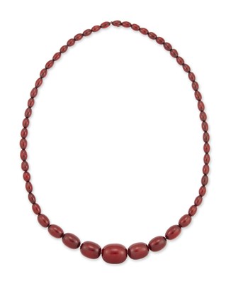 Lot 678 - A CHERRY AMBER BAKELITE BEAD NECKLACE