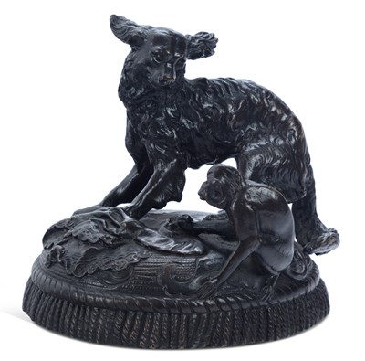 Lot 722 - A BRONZE GROUP OF A DOG AND A MONKEY