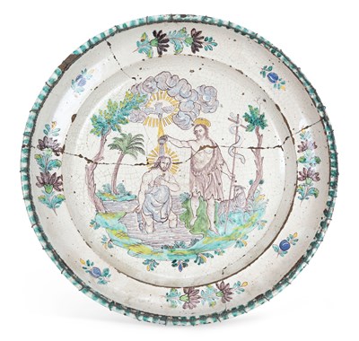 Lot 102 - A TIN GLAZED EARTHENWARE CHARGER