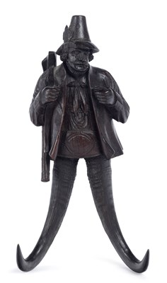 Lot 973 - A BLACK FOREST CARVED WOOD WALL HOOK
