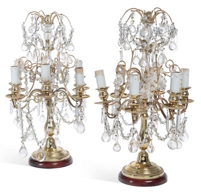 Lot 828 - A PAIR OF GILT METAL AND CUT-GLASS FIVE-LIGHT CANDELABRA TABLE LAMPS